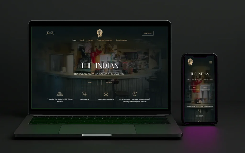 Web de The Indian Villava con su local en penumbra en la portada, vista en portátil y en móvil